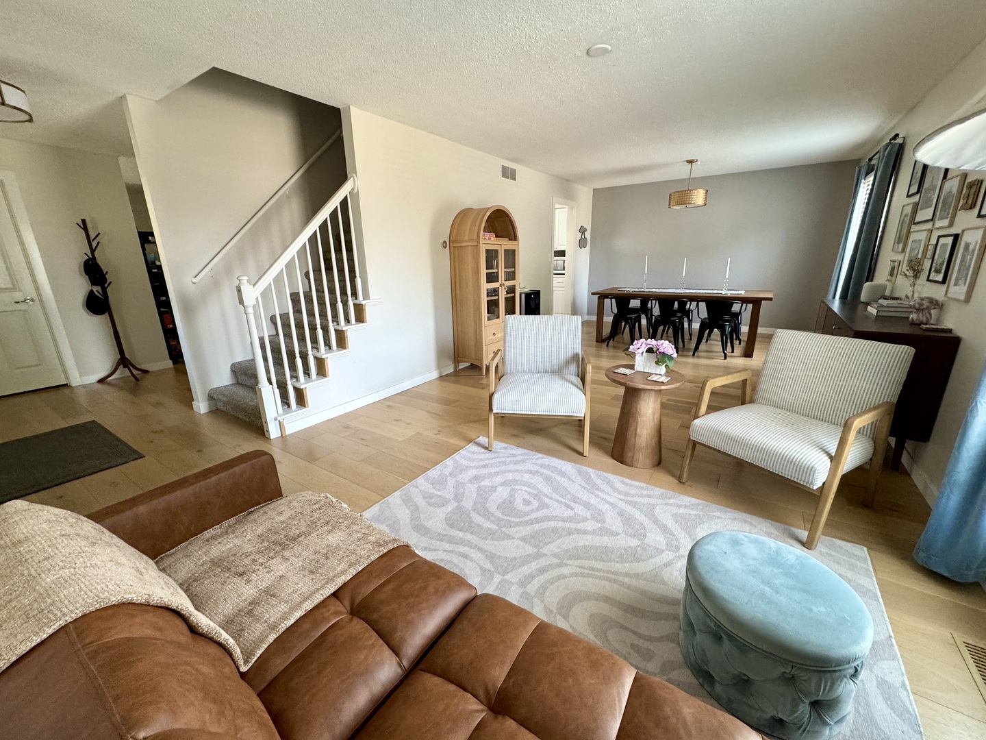 2902 South Myra Ridge Drive Urbana, IL 61802 - Photo 14 of 39 a living room with furniture rug and wooden floor