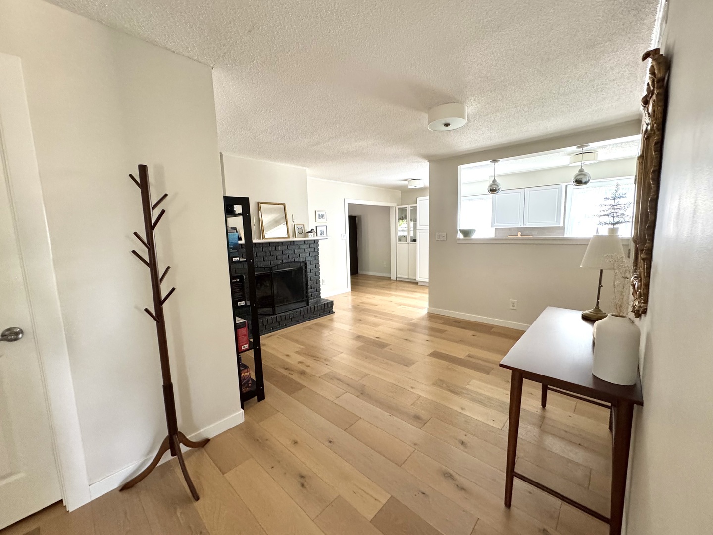 2902 South Myra Ridge Drive Urbana, IL 61802 - Photo 16 of 39 a view of a livingroom with furniture and a flat screen tv