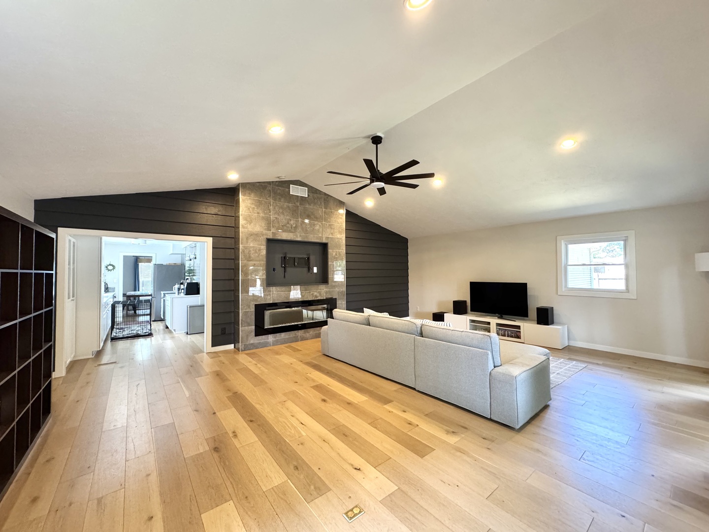 2902 South Myra Ridge Drive Urbana, IL 61802 - Photo 10 of 39 a living room with furniture and a flat screen tv