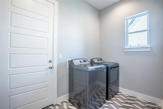 a view of storage and utility room with racks on the wall