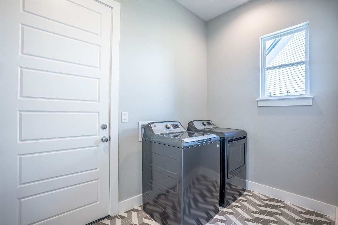 3018 Sunridge Drive, Unit 4 Austin, TX 78741 - Photo 14 of 34 a view of storage and utility room with racks on the wall