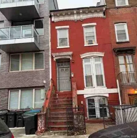 a front view of a building with a glass door