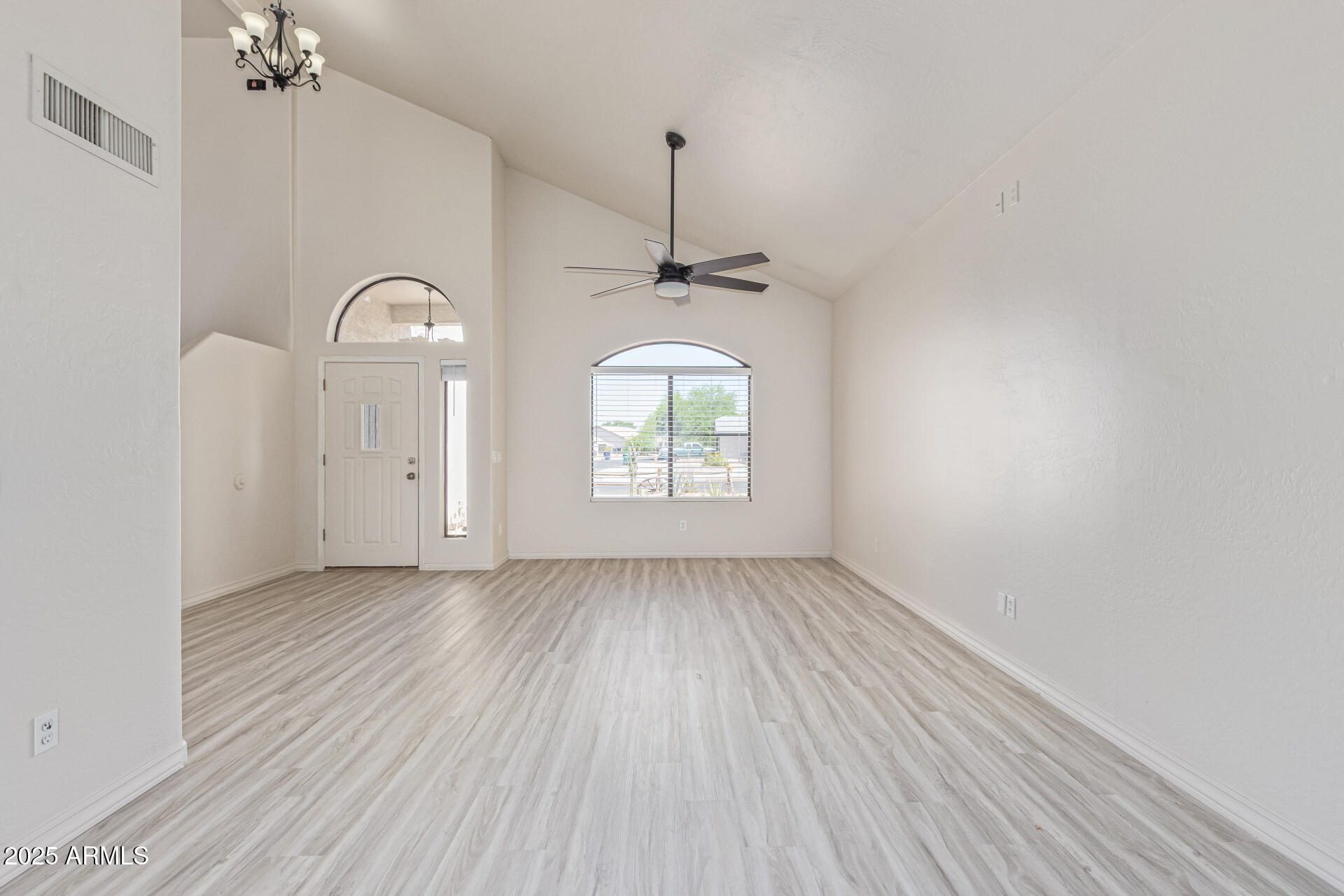 4933 East Downing Street Mesa, AZ 85205 - Photo 11 of 44 wooden floor in a hall with a window