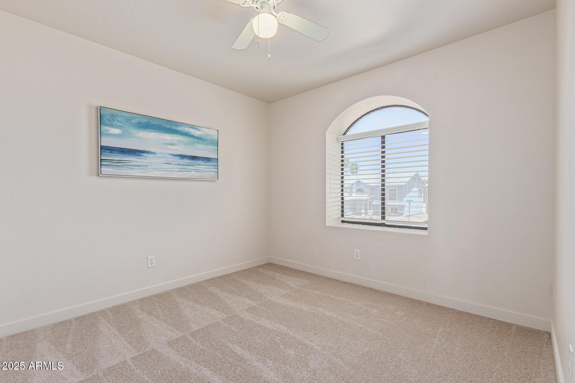 4933 East Downing Street Mesa, AZ 85205 - Photo 30 of 44 an empty room with windows