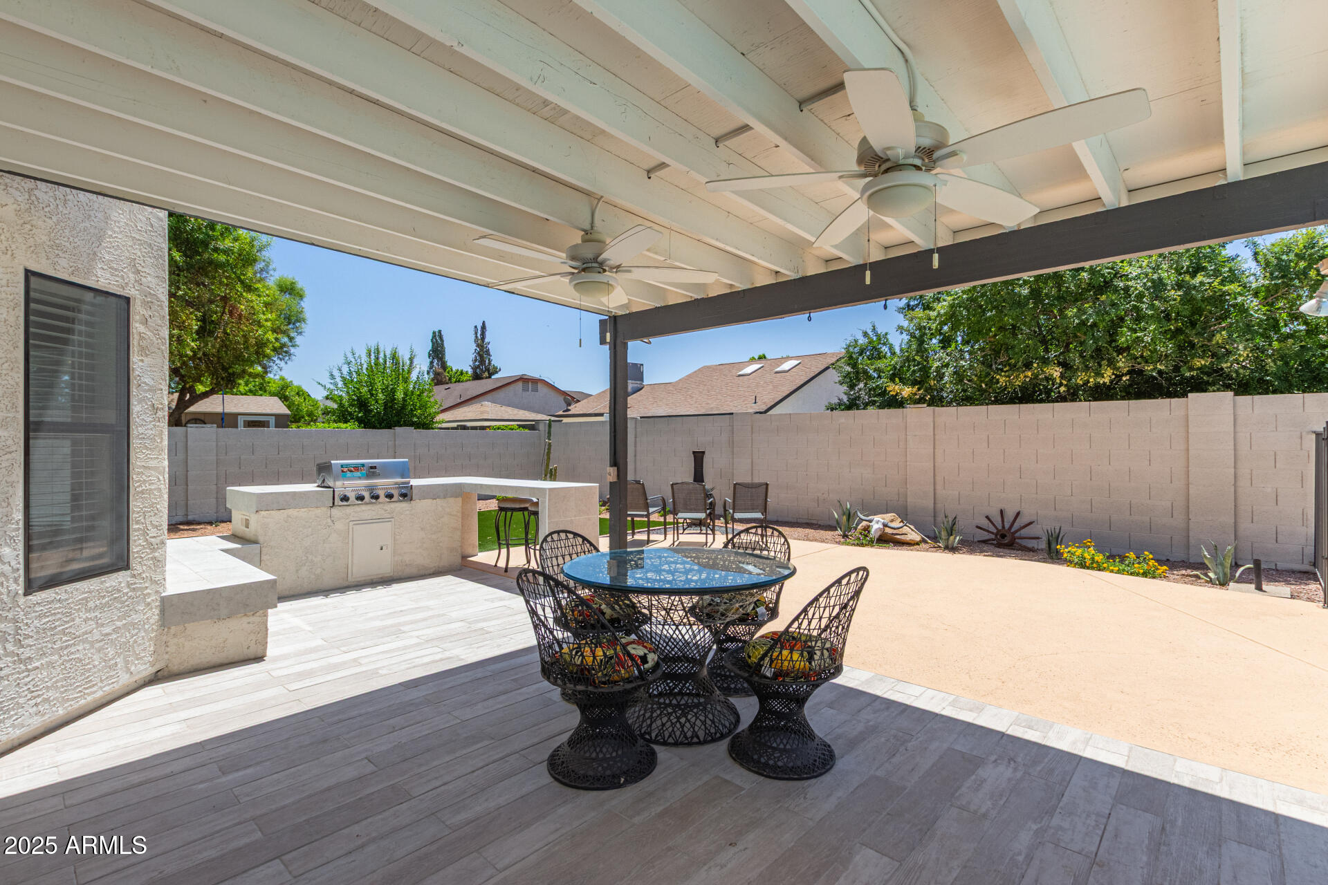 4933 East Downing Street Mesa, AZ 85205 - Photo 38 of 44 a outdoor space with a table and chairs
