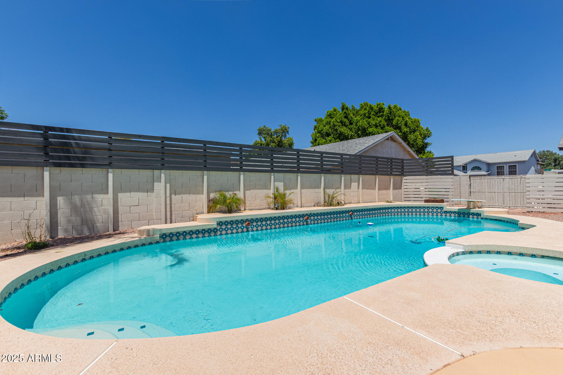 4933 East Downing Street Mesa, AZ 85205 - Photo 42 of 44 a view of a backyard with a swimming pool