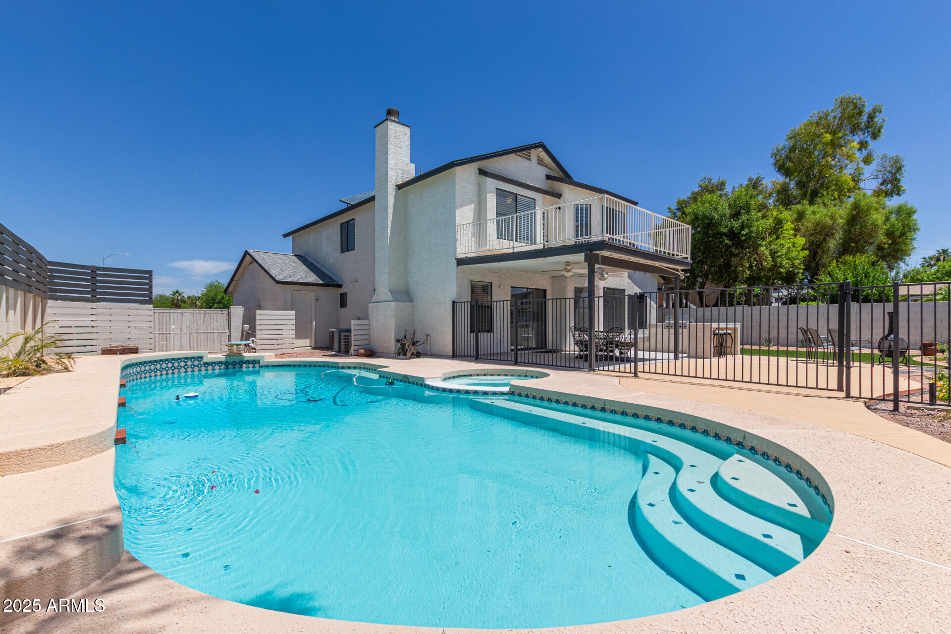 4933 East Downing Street Mesa, AZ 85205 - Photo 43 of 44 a view of a house with swimming pool