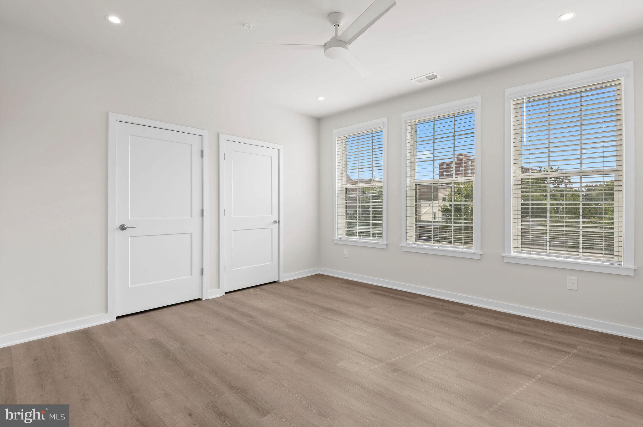 26 South York Road, Unit 209 Hatboro, PA 19040 - Photo 15 of 51 an empty room with windows and closet