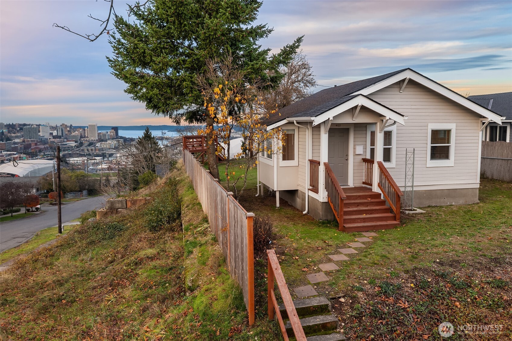 403 East Wright Avenue Tacoma, WA 98404 - Photo 3 of 29 a view of a house with a yard