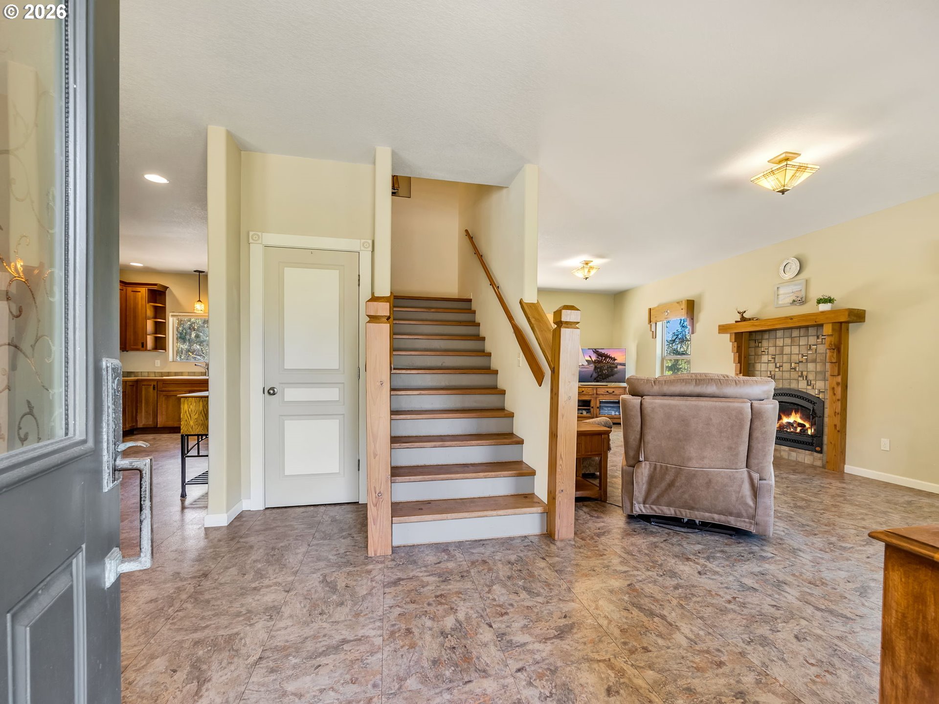 1077 Southwest Ridge Road Warrenton, OR 97146 - Photo 4 of 46 a view of a livingroom with furniture and staircase