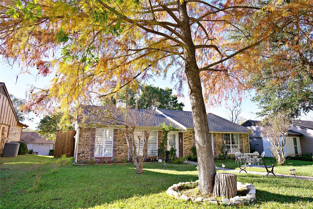 2025 High Bluff Drive Garland, TX 75041 - Photo 2 of 35 a front view of a house with a yard