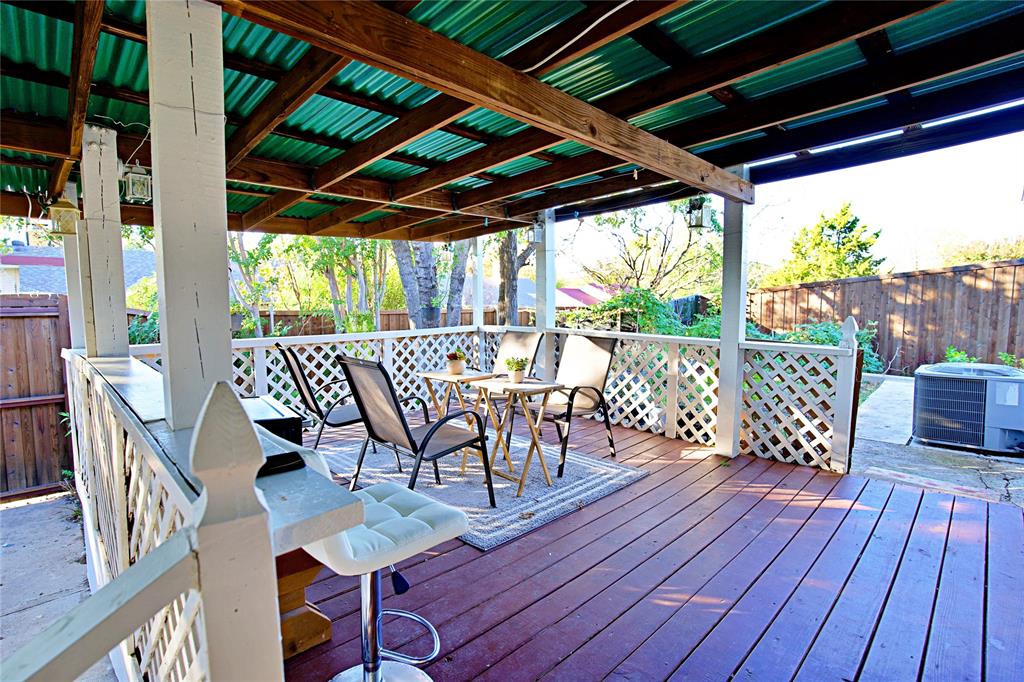2025 High Bluff Drive Garland, TX 75041 - Photo 26 of 35 a view of a chairs and table in the deck