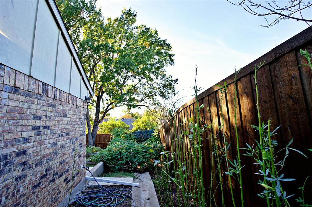 2025 High Bluff Drive Garland, TX 75041 - Photo 27 of 35 a view of a garden from a balcony