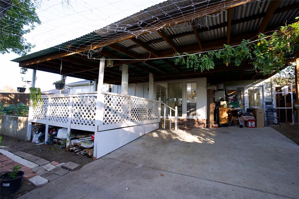 2025 High Bluff Drive Garland, TX 75041 - Photo 35 of 35 a view of a chairs and table in backyard of the house