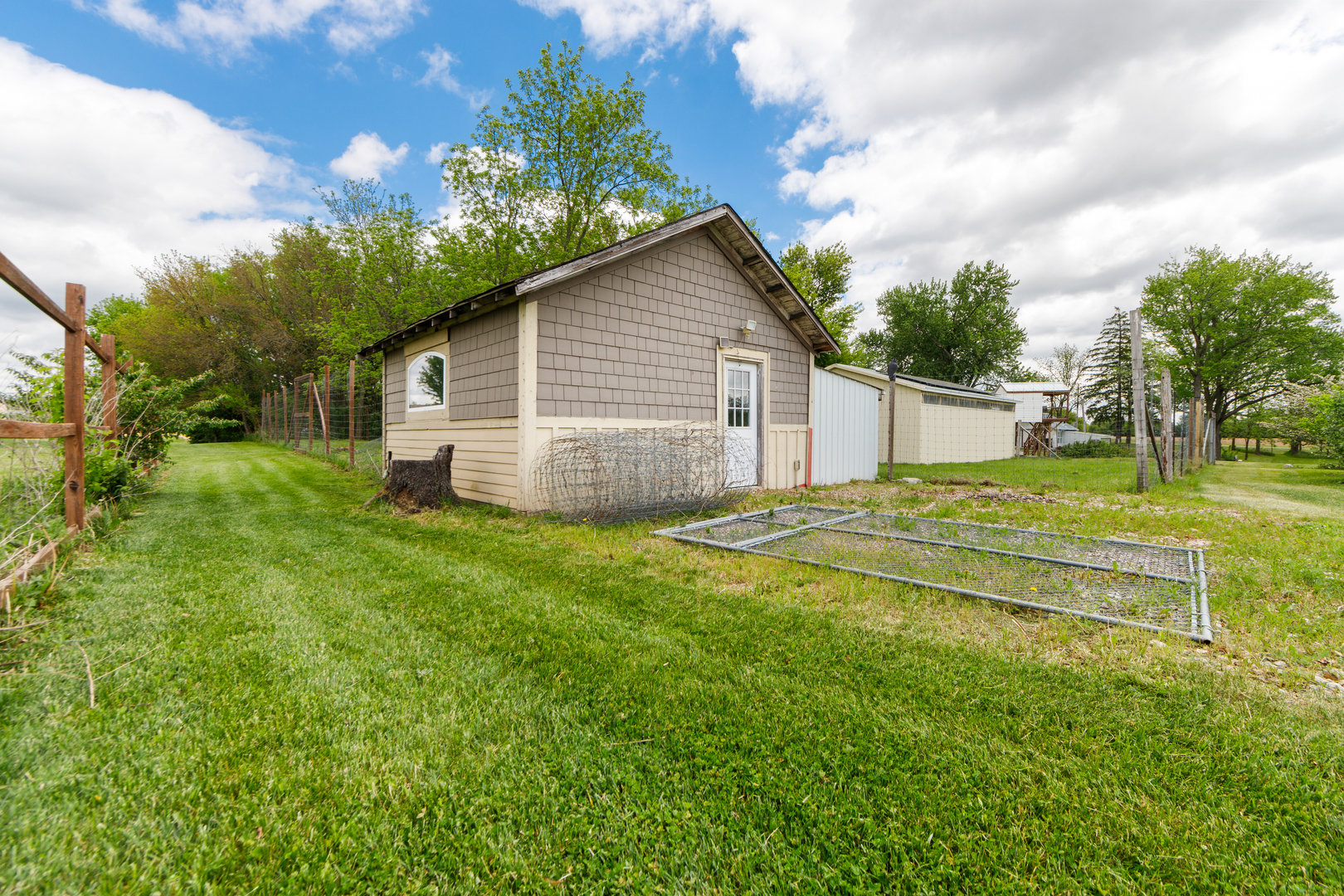 9909 Winn Road Spring Grove, IL 60081 - Photo 99 of 100 a view of a house with a yard