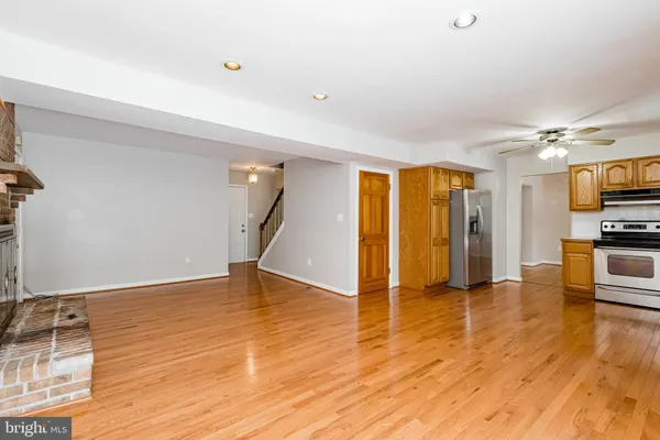 a view of a livingroom with wooden floor