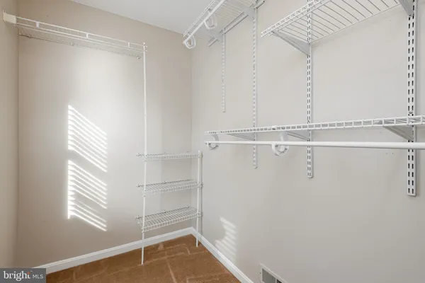 a view of a room with racks on the wall