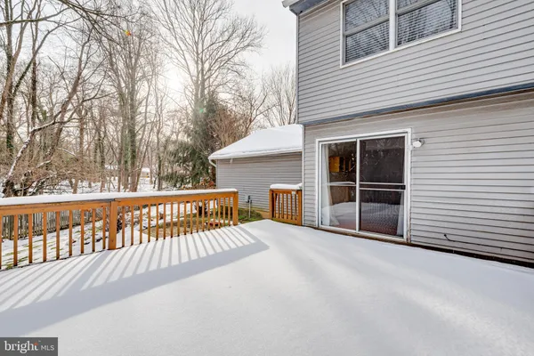 a view of a balcony with trees
