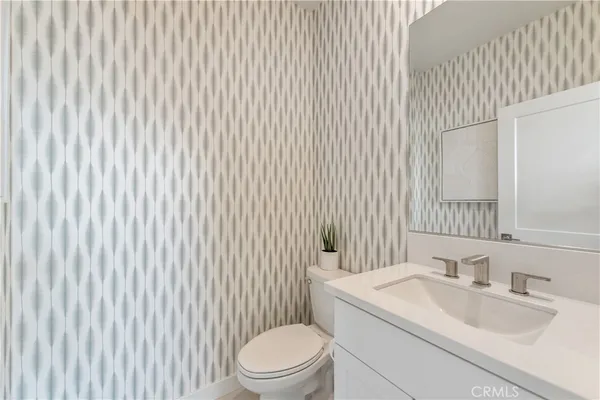 a view of a living room and dining room