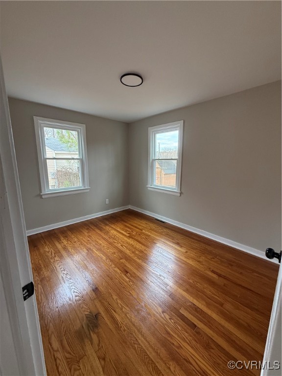 1809 Skipwith Road Henrico, VA 23229 - Photo 13 of 18 a view of empty room with wooden floor and fan