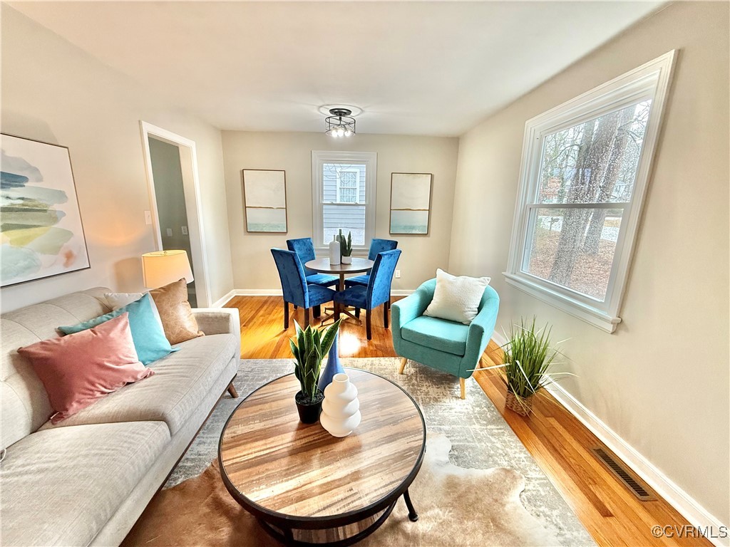 1809 Skipwith Road Henrico, VA 23229 - Photo 4 of 18 a living room with furniture kitchen view and a large window
