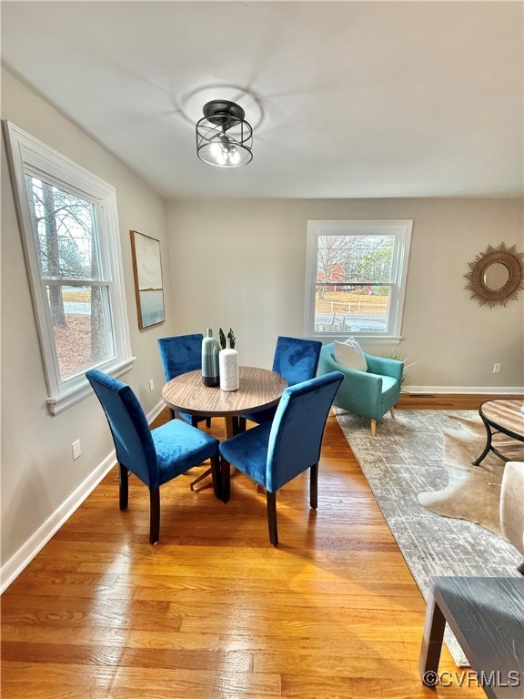 1809 Skipwith Road Henrico, VA 23229 - Photo 5 of 18 a view of a dining room with furniture and wooden floor