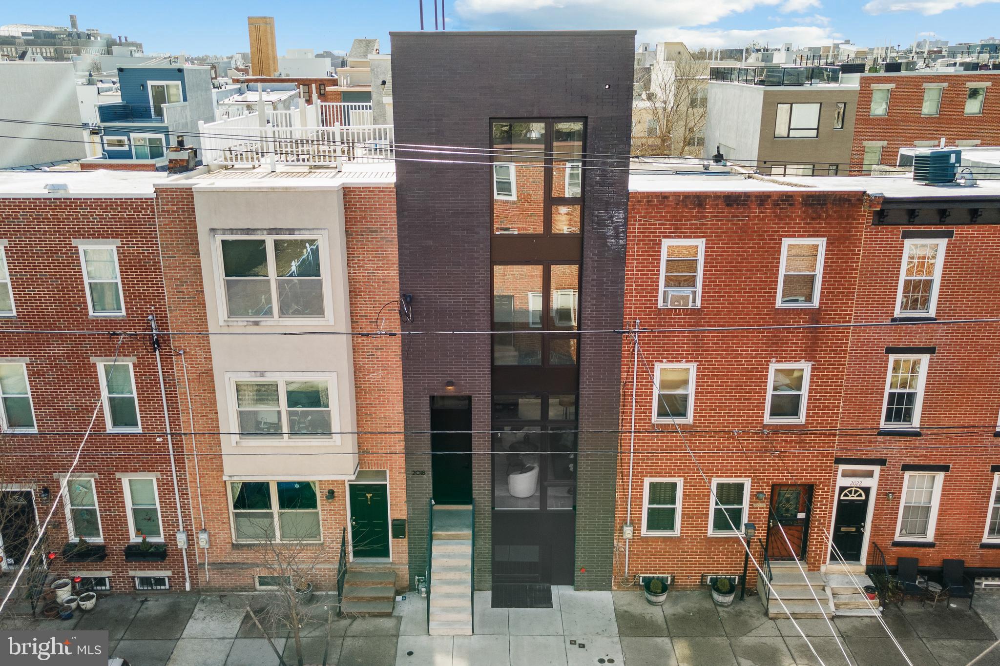 2018 Ellsworth Street Philadelphia, PA 19146 - Photo 1 of 47 a front view of a multi story building