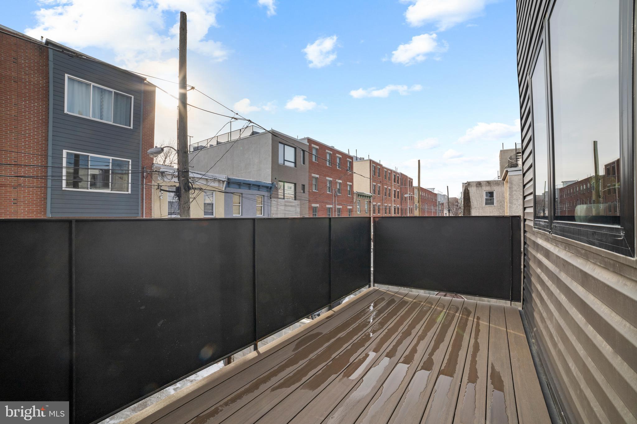 2018 Ellsworth Street Philadelphia, PA 19146 - Photo 13 of 47 a view of balcony with wooden floor