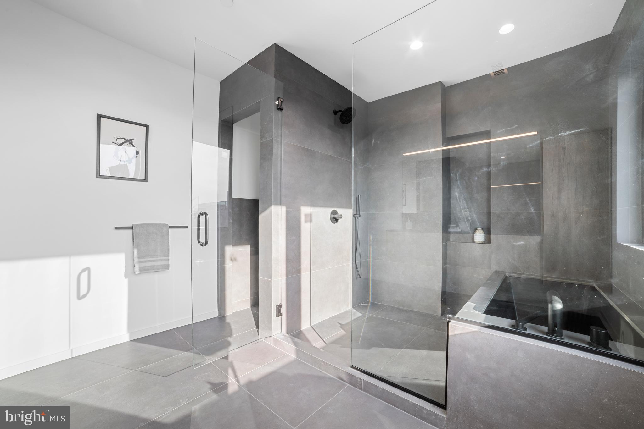 2018 Ellsworth Street Philadelphia, PA 19146 - Photo 24 of 47 a bathroom with a tub and a shower
