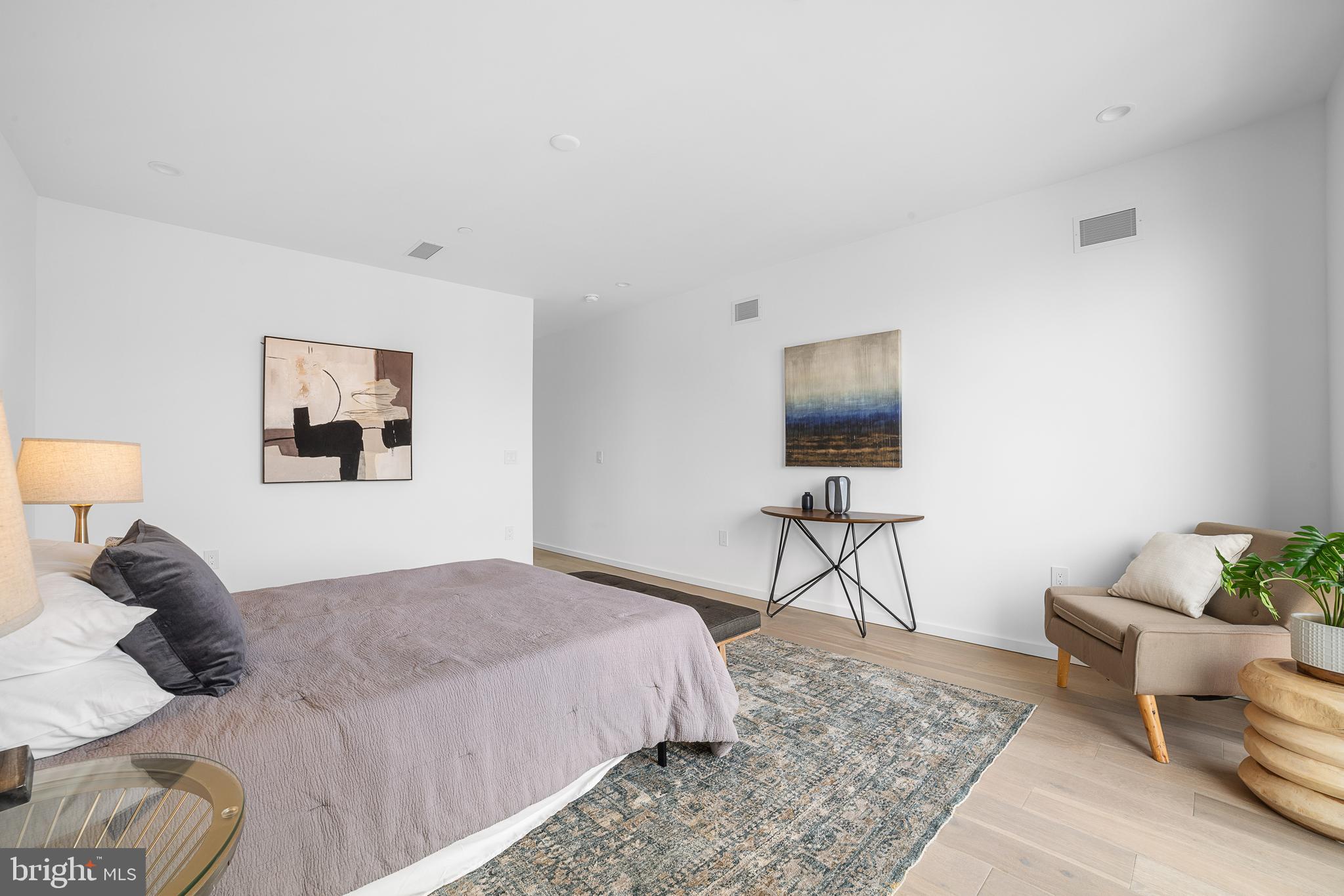 2018 Ellsworth Street Philadelphia, PA 19146 - Photo 27 of 47 a bedroom with a bed and a flat screen tv