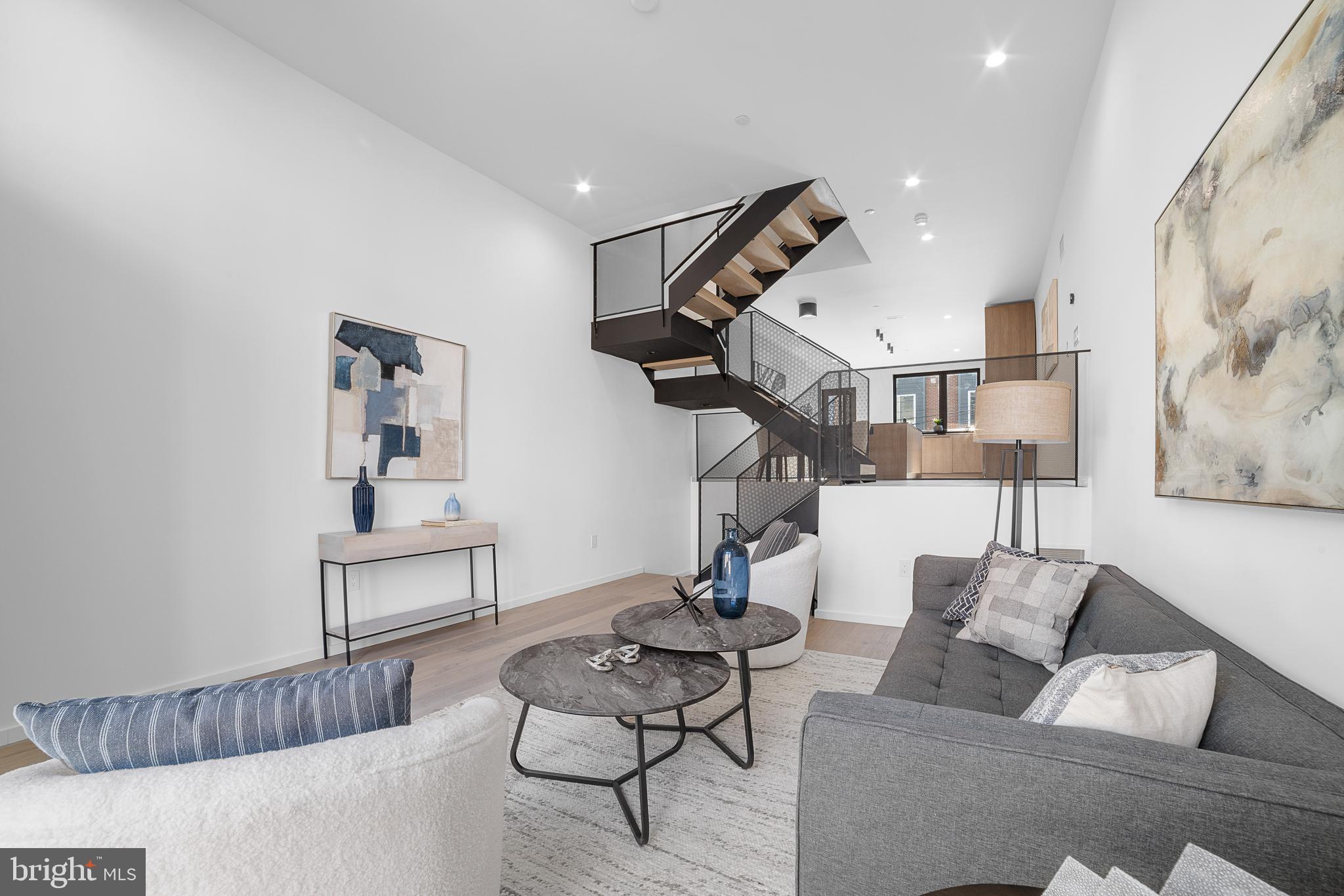 2018 Ellsworth Street Philadelphia, PA 19146 - Photo 3 of 47 a living room with furniture and wooden floor