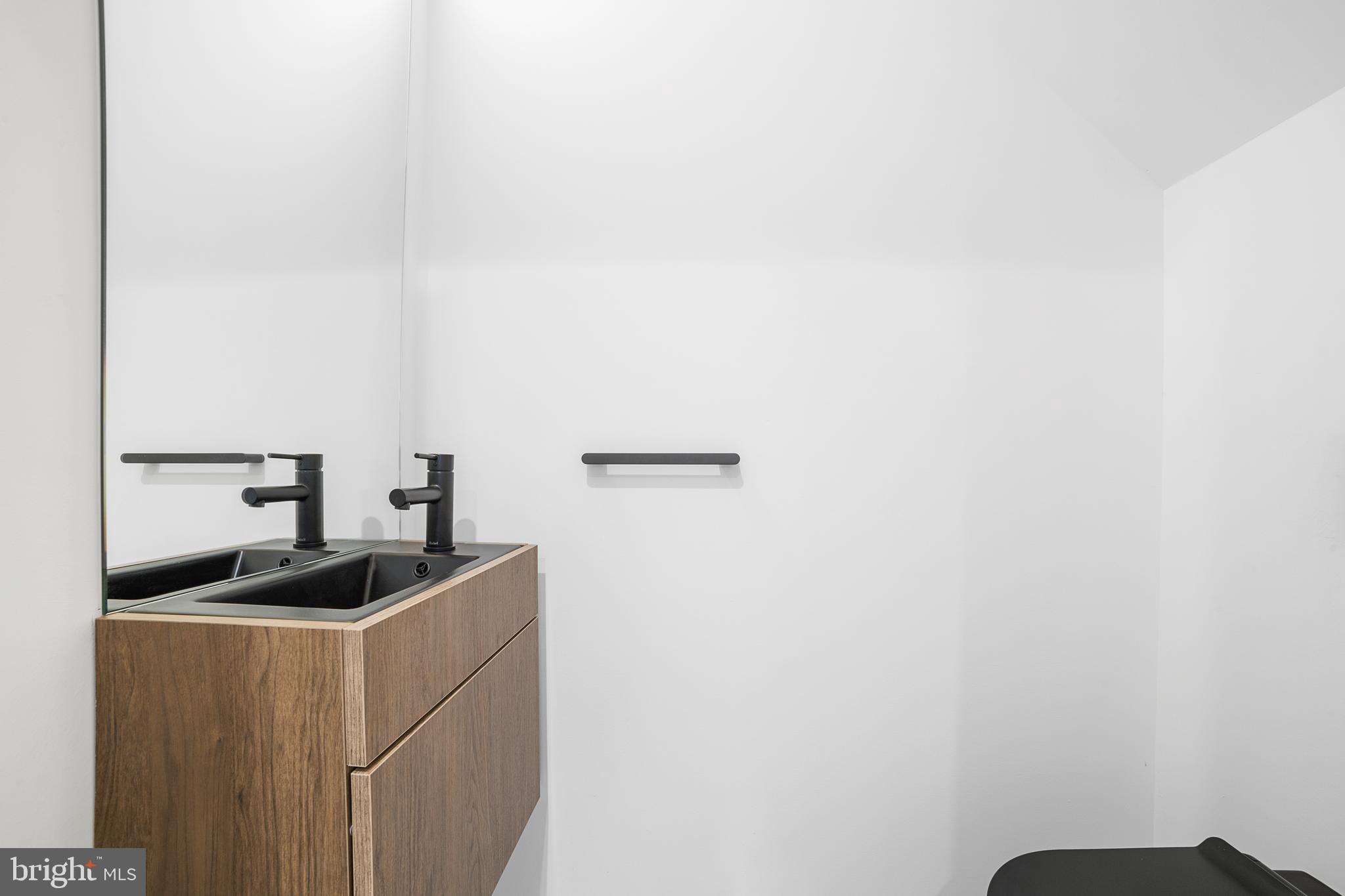 2018 Ellsworth Street Philadelphia, PA 19146 - Photo 41 of 47 a kitchen with a sink and cabinets