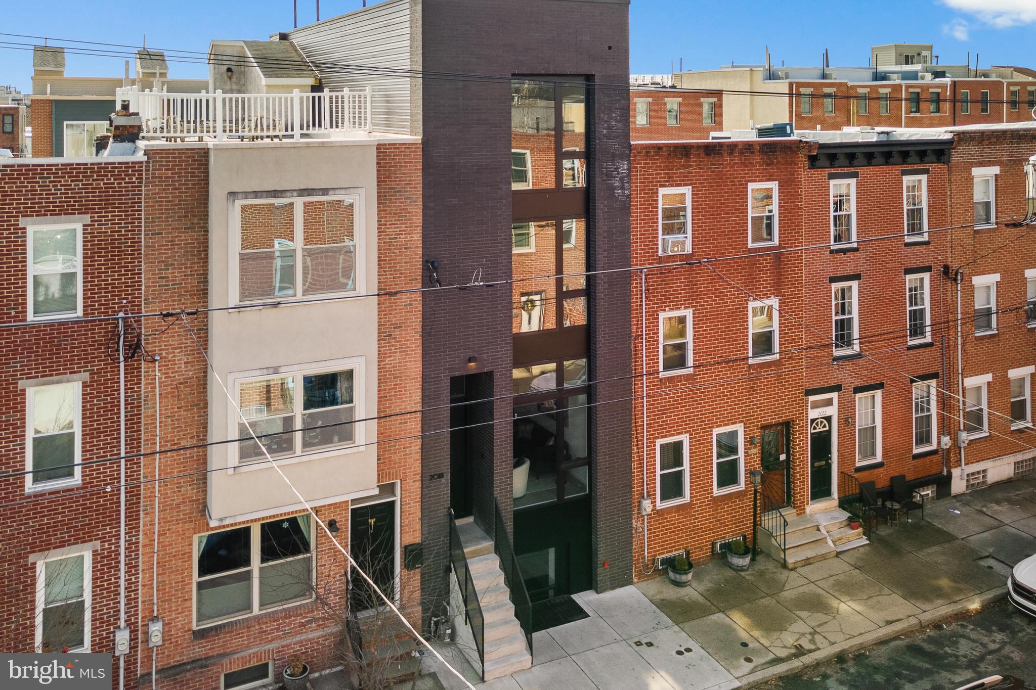 2018 Ellsworth Street Philadelphia, PA 19146 - Photo 42 of 47 a front view of a building with windows