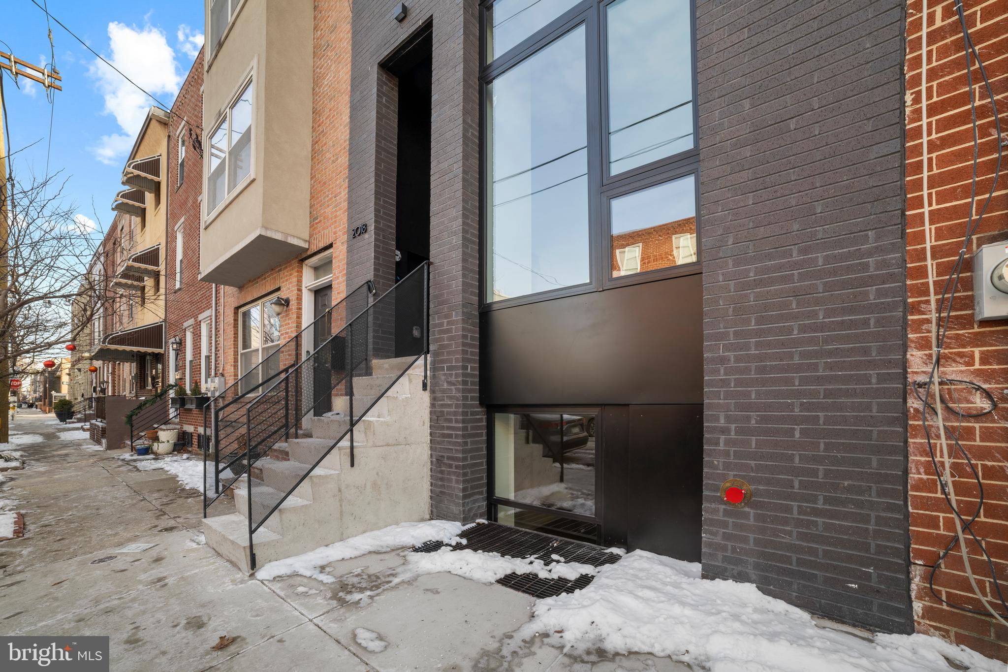 2018 Ellsworth Street Philadelphia, PA 19146 - Photo 44 of 47 a view of a brick building with many windows