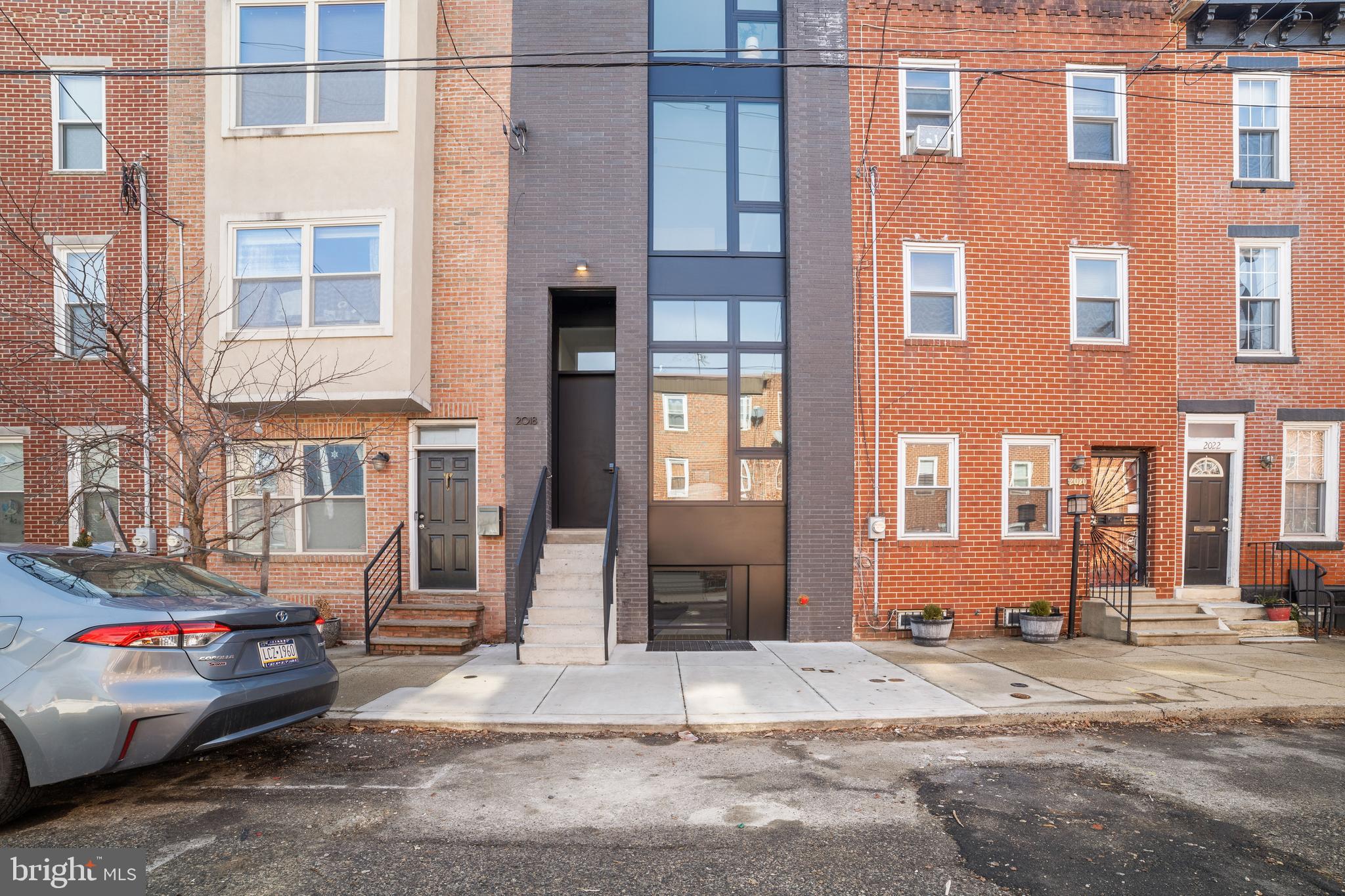 2018 Ellsworth Street Philadelphia, PA 19146 - Photo 45 of 47 a view of a brick building with many windows