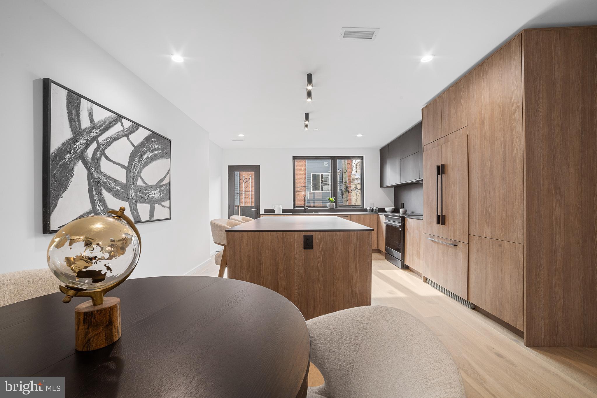 2018 Ellsworth Street Philadelphia, PA 19146 - Photo 10 of 47 a kitchen with stainless steel appliances a stove refrigerator and cabinets