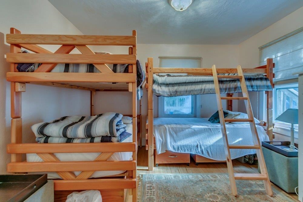 3149 1st Avalon, NJ 08202 - Photo 11 of 20 a bedroom with a bed and window