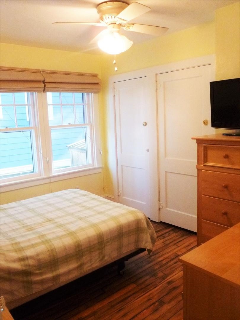 3149 1st Avalon, NJ 08202 - Photo 17 of 20 a bedroom with a bed and flat screen tv