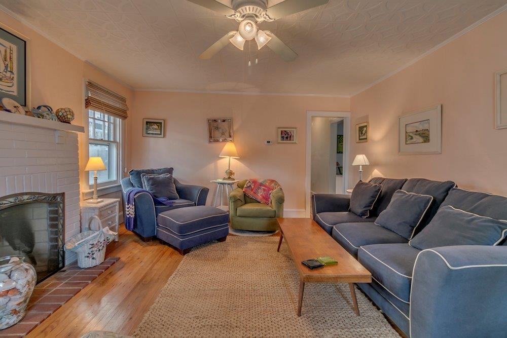 3149 1st Avalon, NJ 08202 - Photo 4 of 20 a living room with furniture and a fireplace