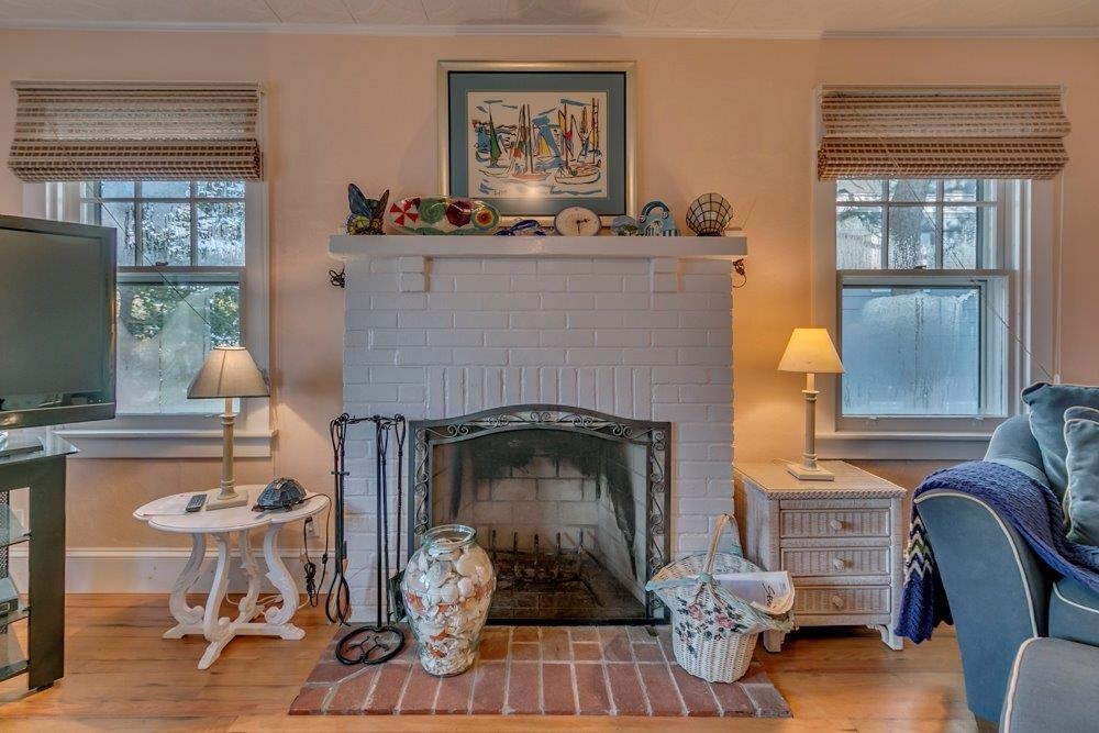 3149 1st Avalon, NJ 08202 - Photo 6 of 20 a living room with furniture and a fireplace