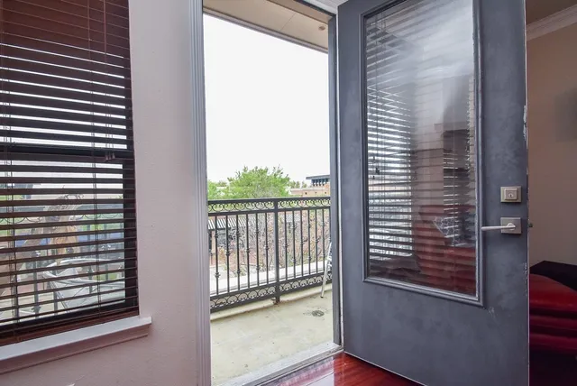 a view of a balcony and window