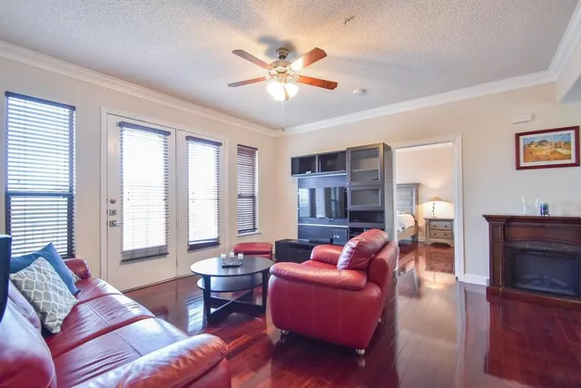 a living room with furniture or couches and a fireplace