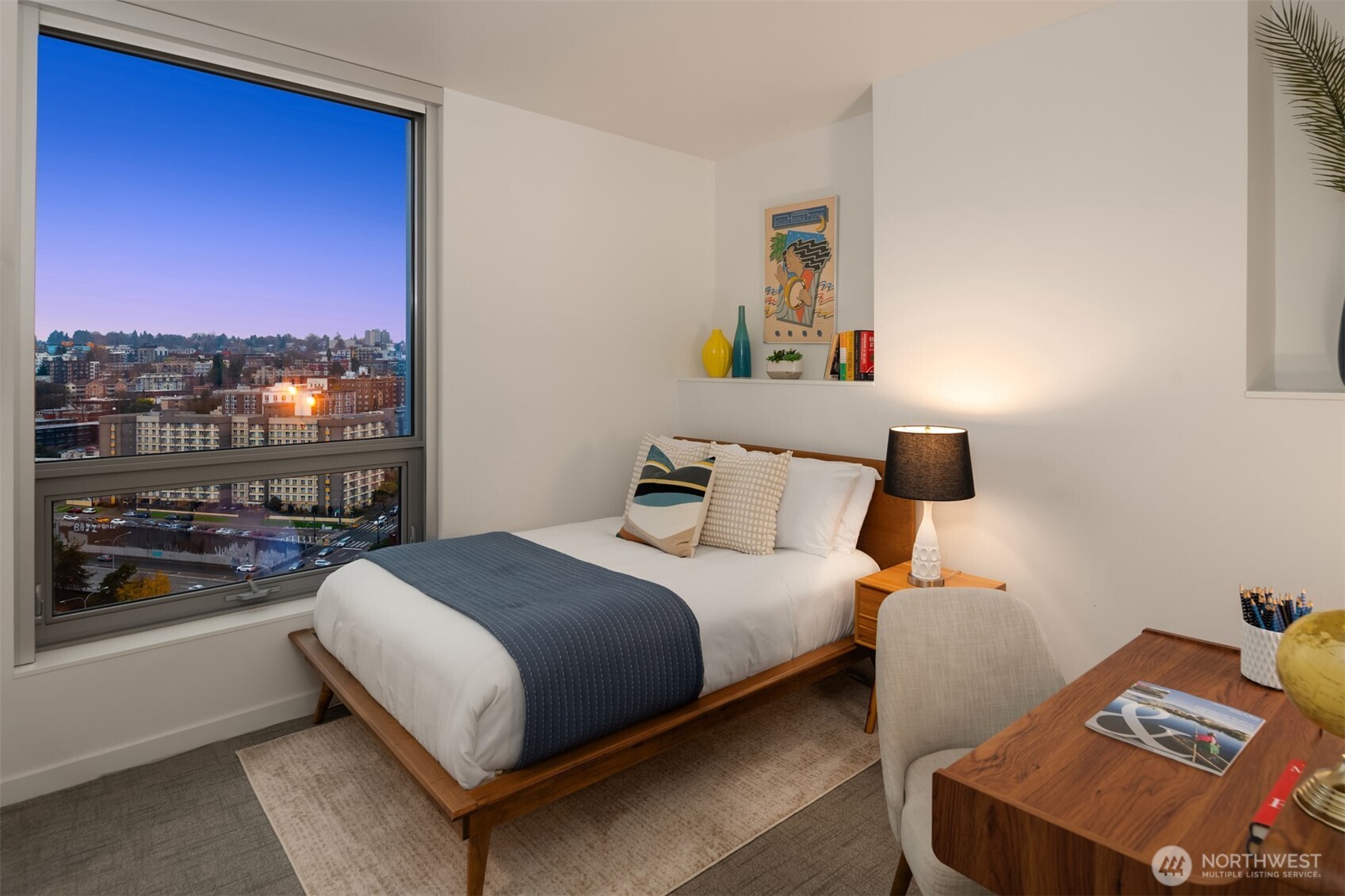 1808 Minor Avenue, Unit 2308 Seattle, WA 98101 - Photo 13 of 36 a bedroom with a bed and a window