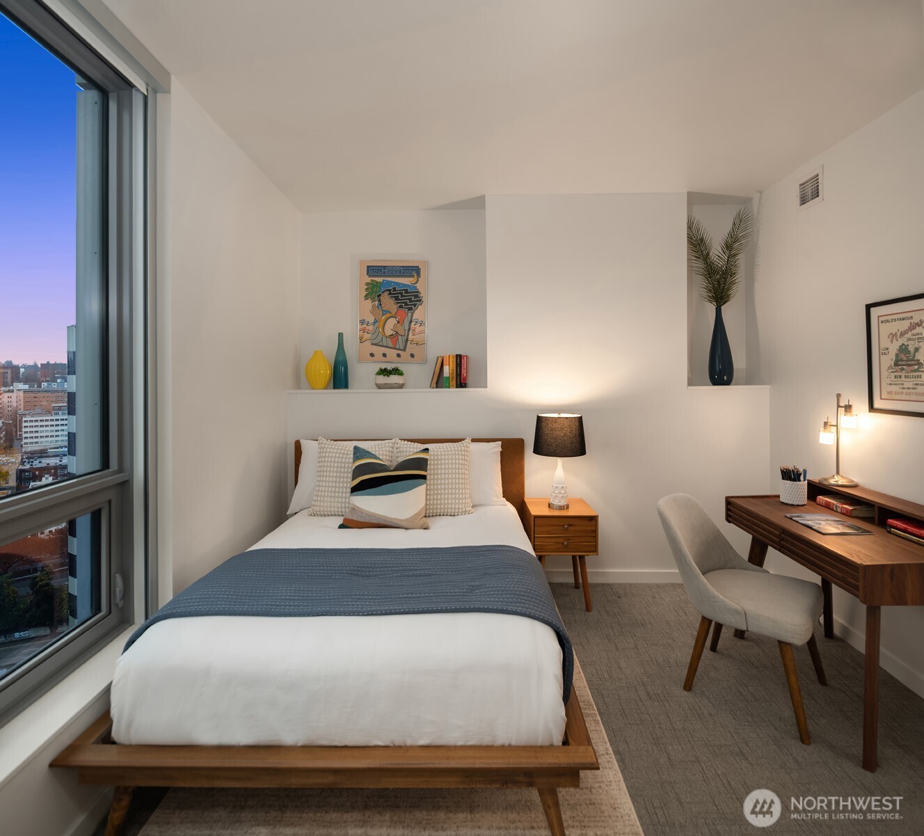 1808 Minor Avenue, Unit 2308 Seattle, WA 98101 - Photo 16 of 36 a room with a bed and a desk