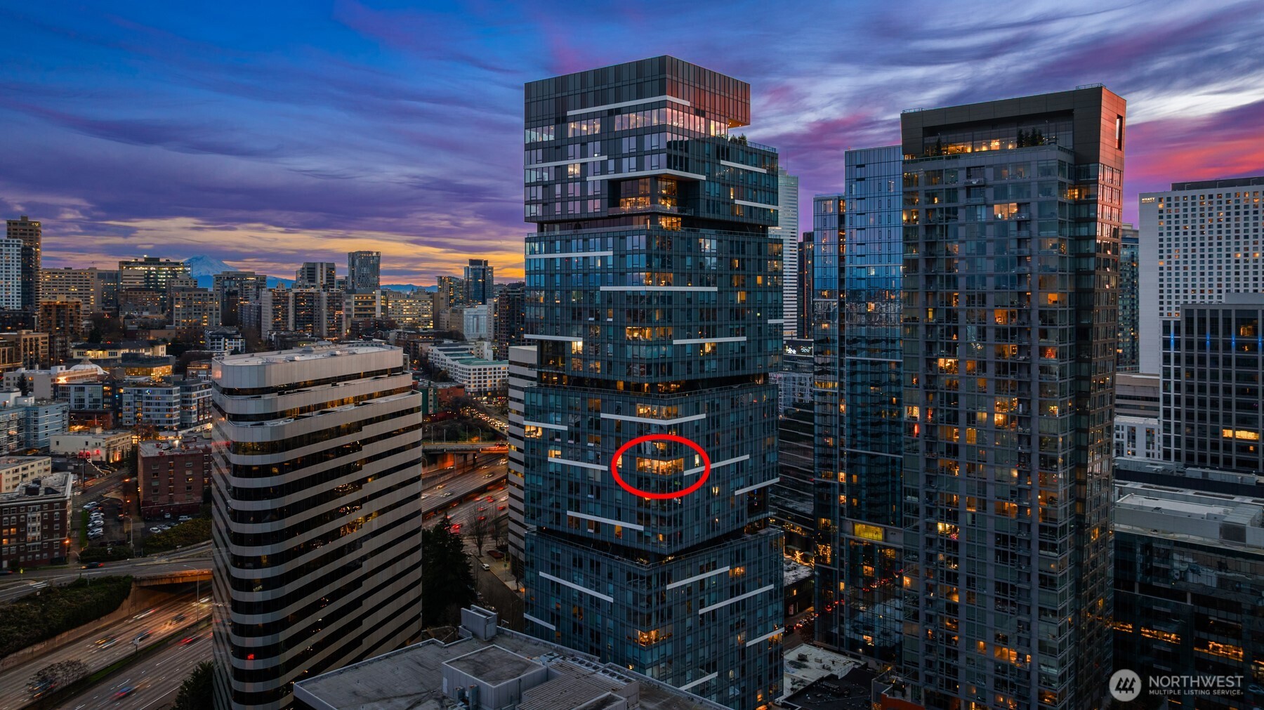 1808 Minor Avenue, Unit 2308 Seattle, WA 98101 - Photo 2 of 36 a city street filled with lots of tall buildings