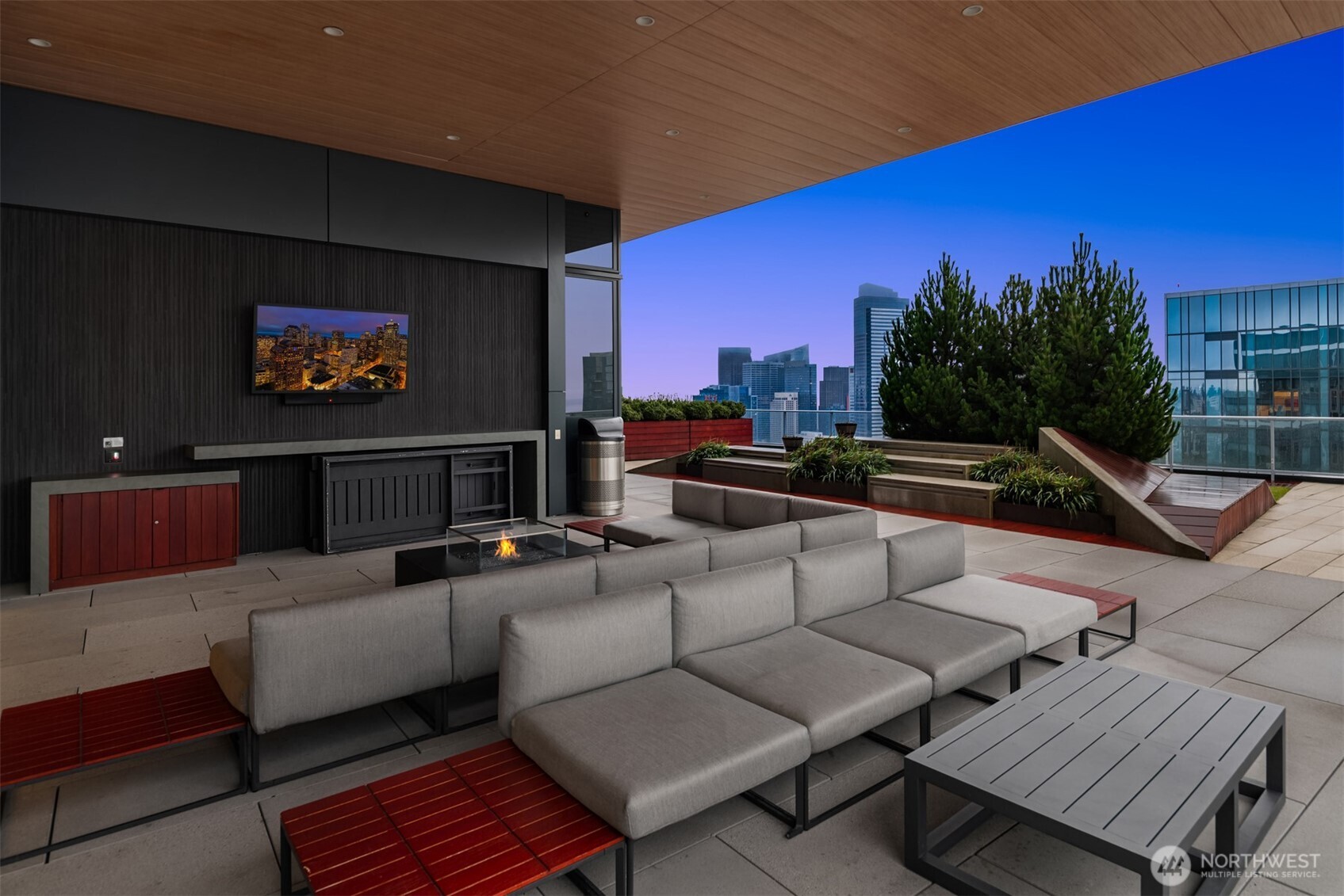 1808 Minor Avenue, Unit 2308 Seattle, WA 98101 - Photo 29 of 36 a outdoor living space with furniture and a flat screen tv