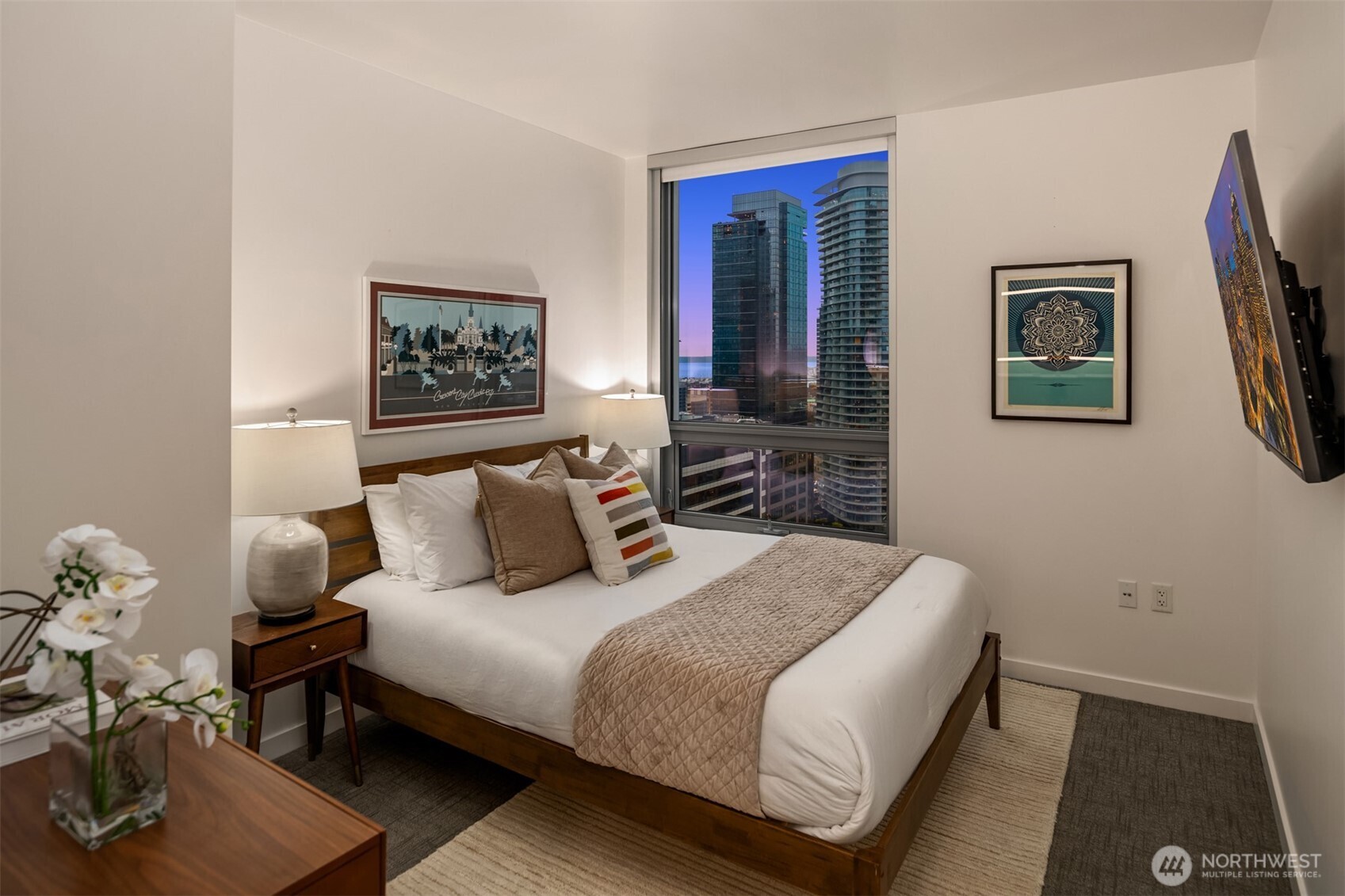 1808 Minor Avenue, Unit 2308 Seattle, WA 98101 - Photo 10 of 36 a bedroom with bed and a window