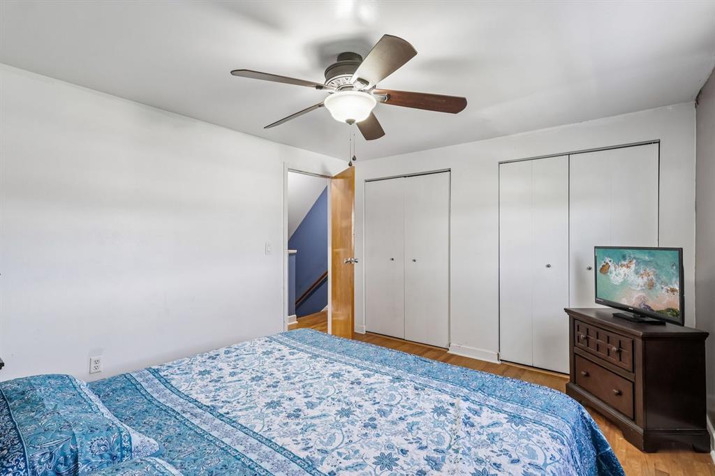 239 Whitestown Village, Unit F Butler, PA 16001 - Photo 17 of 40 a bedroom with a bed and a flat screen tv