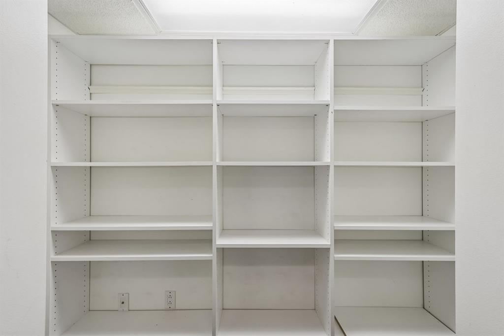 239 Whitestown Village, Unit F Butler, PA 16001 - Photo 27 of 40 a view of walk in closet with empty racks