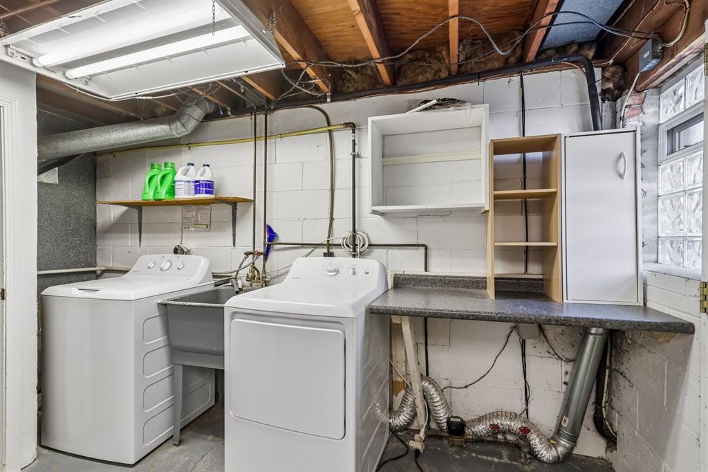 239 Whitestown Village, Unit F Butler, PA 16001 - Photo 28 of 40 a utility room with dryer and washer